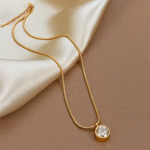 Features a sparkling American Diamond at the center of a sleek round pendant